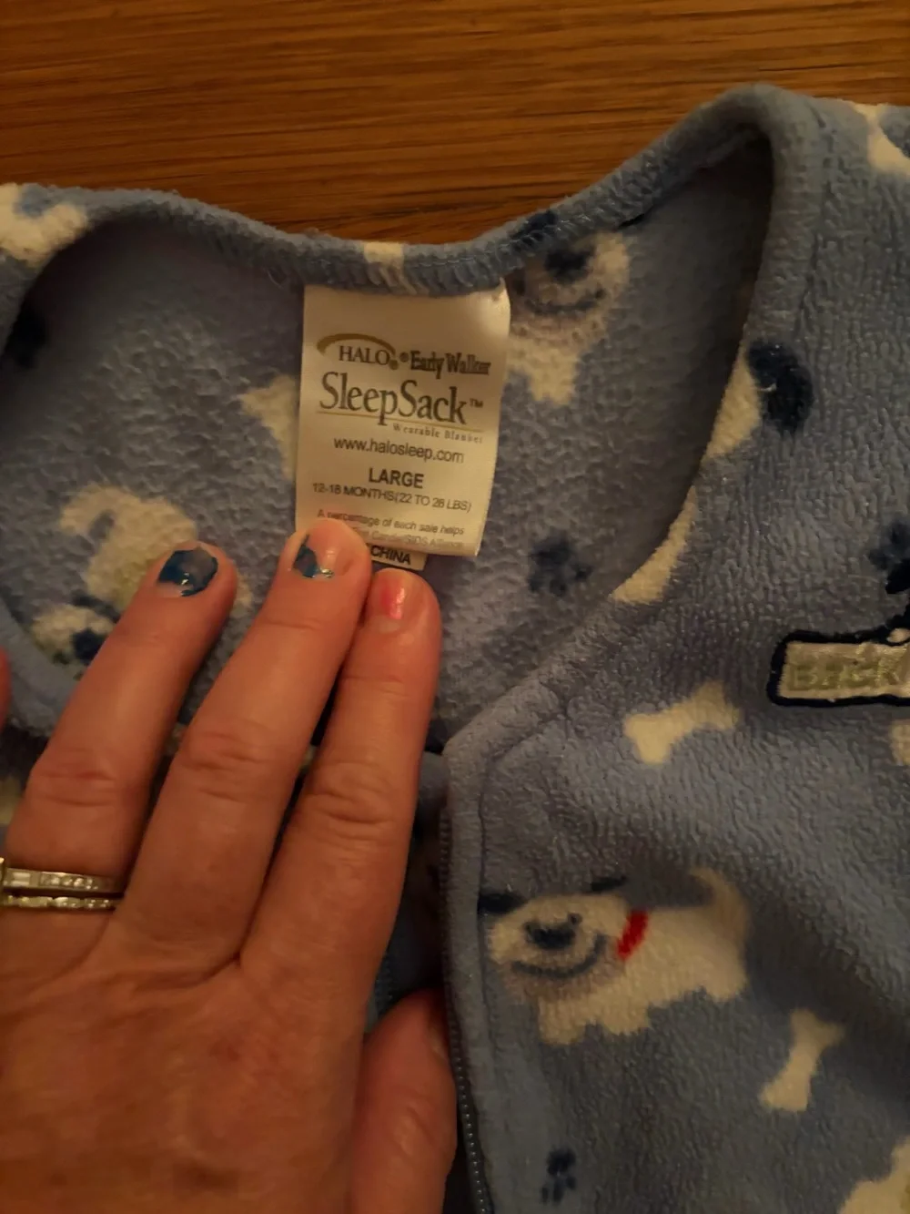 HALO Early Walker SleepSack in a blue puppy/dog fleece pattern
